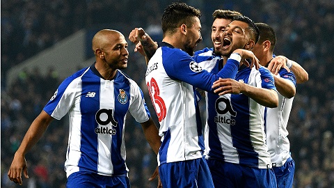 FC Porto defender Diogo Dalot celebrates their victory with