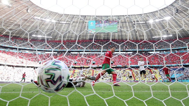 Ronaldo scores against Germany during Euro 2020 in a sparsely populated stadium in Munich owing to the Coronavirus pandemic. (Photo: Alexander Hassenstein/Getty Images)