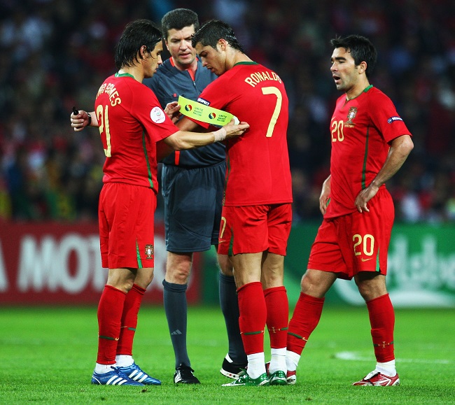 Nuno Gomes hands over the captain’s armband to Ronaldo during Portugal v Turkey at Euro 2008. (Photo: Laurence Griffiths/Getty Images)